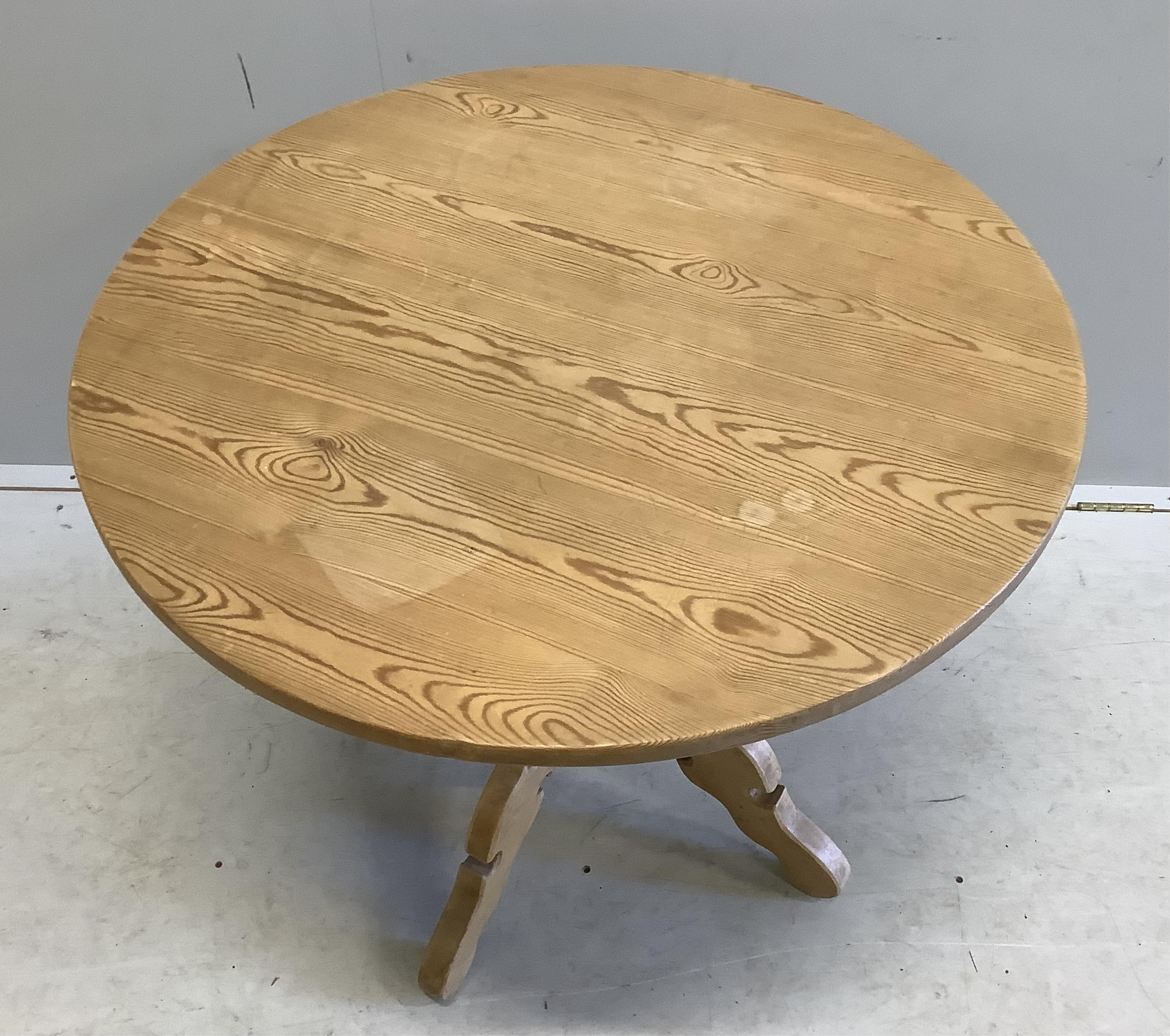 A Victorian style circular pine centre table, diameter 83cm, height 75cm. Condition - fair